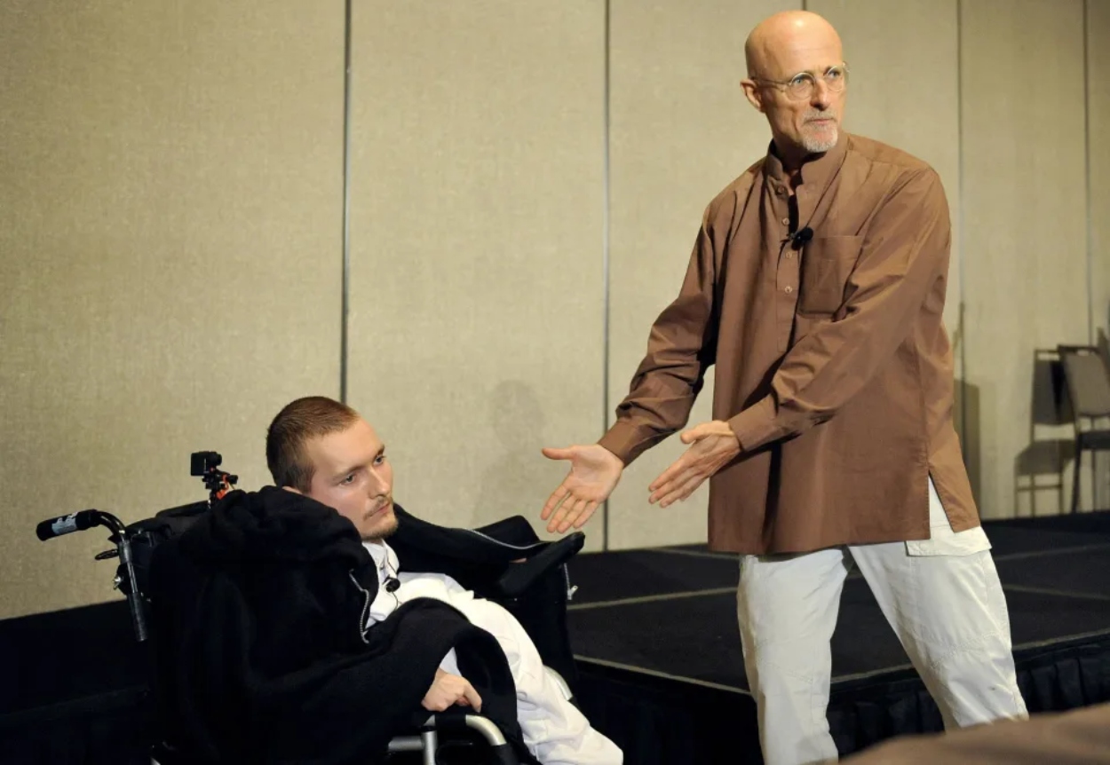 Sergio Canavero next to Valery Spiridonov, a man with a disability who was going to sign up as a volunteer in one of his experiments.  Photo: Rex Features