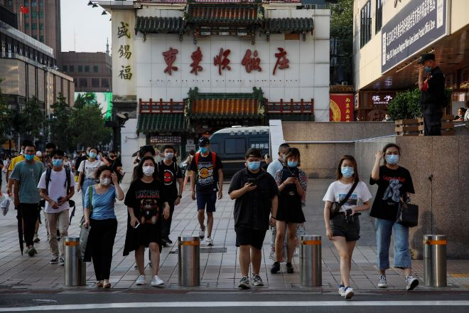 China denies deflation, but keeps cutting interest rates to boost demand