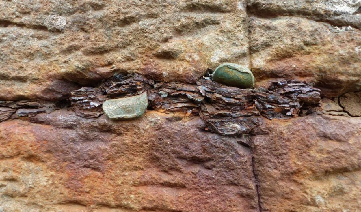 Giant's Causeway workers remove 10,000 coins from rocks
